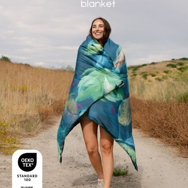 Selkbag Blanket 432 Hz – Reisedecke mit Poncho-Funktion in Mix-Design
